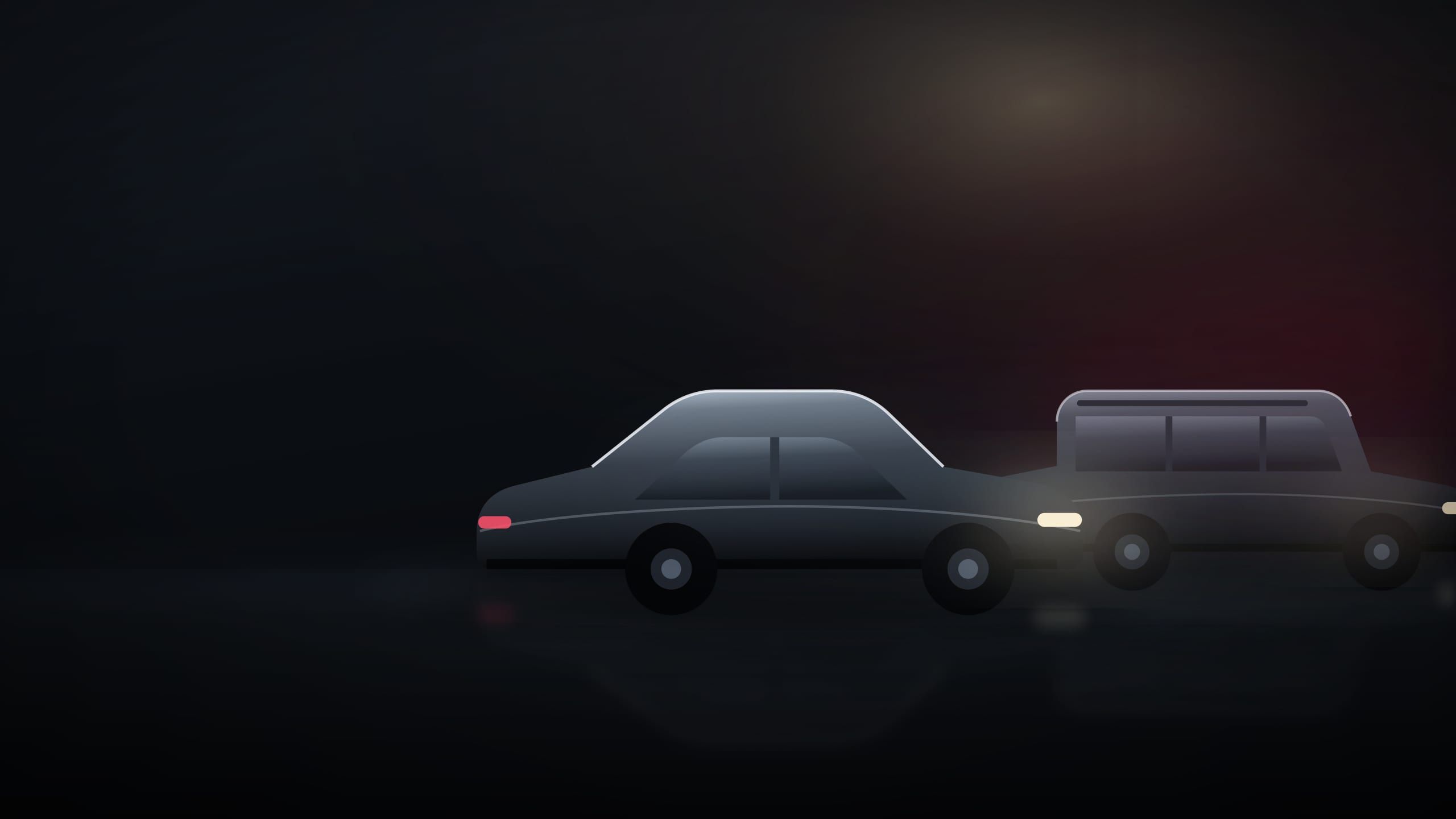Airline Limousine's black executive sedan and SUV lit at night